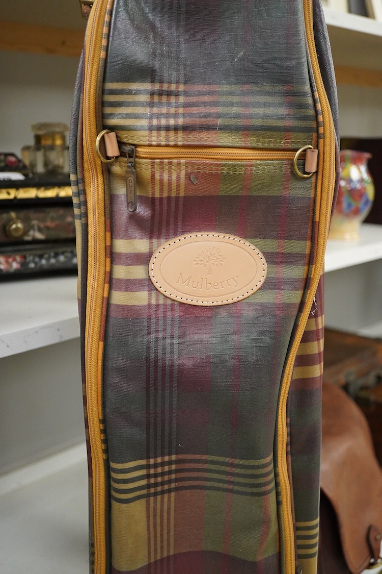 A Mulberry tartan canvas golf case, holdall and umbrella